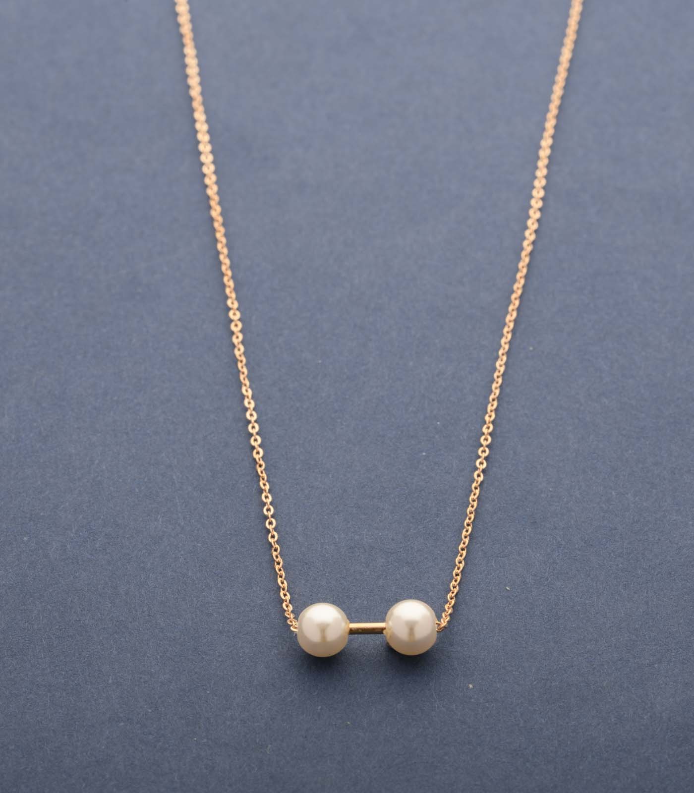 Tiny Dumbel Of Pearls Necklace