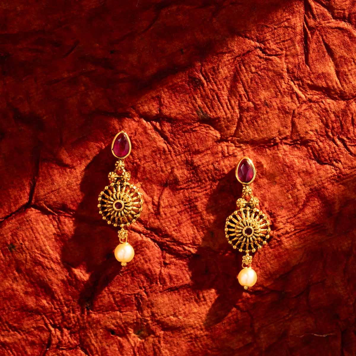 Radiant Sunburst Gold Dangler Earrings