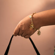 Golden Floral Charm Bracelet with Pearl Accents