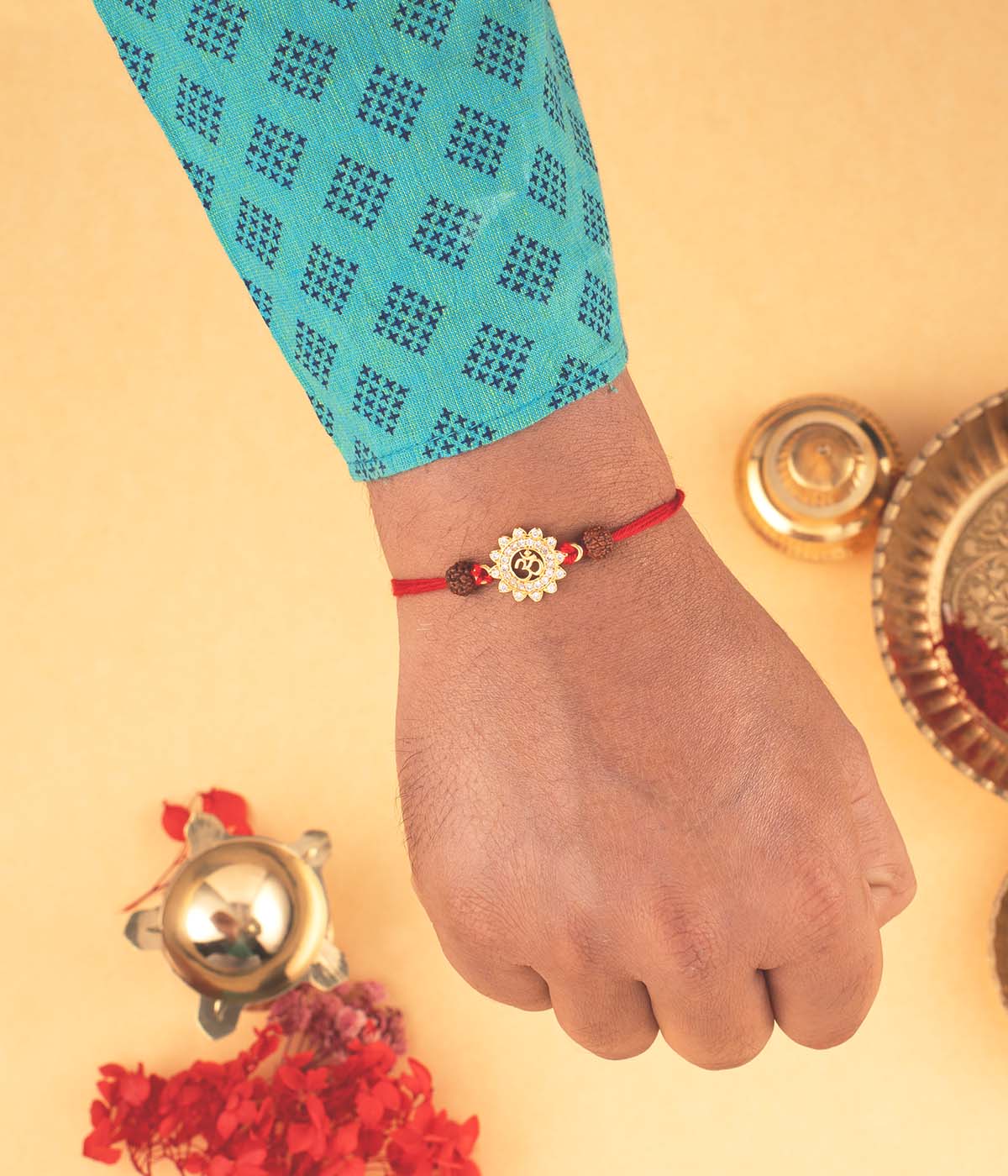 Om Sunburst Gold-Plated Rakhi
