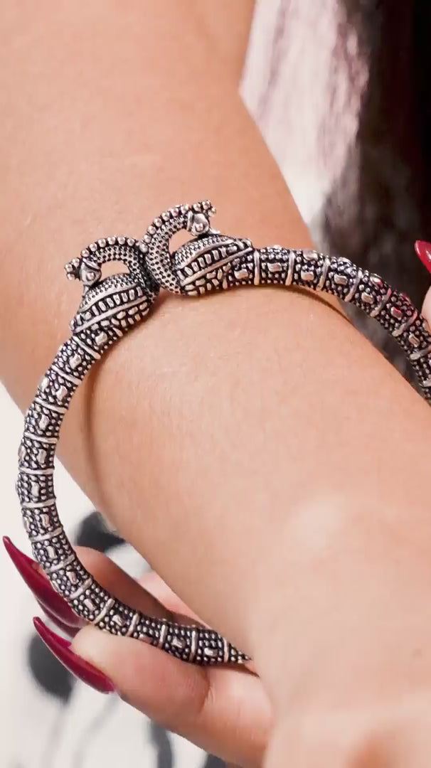 Load video: Oxidised Peacock Motif  Bangles (Set of 2)